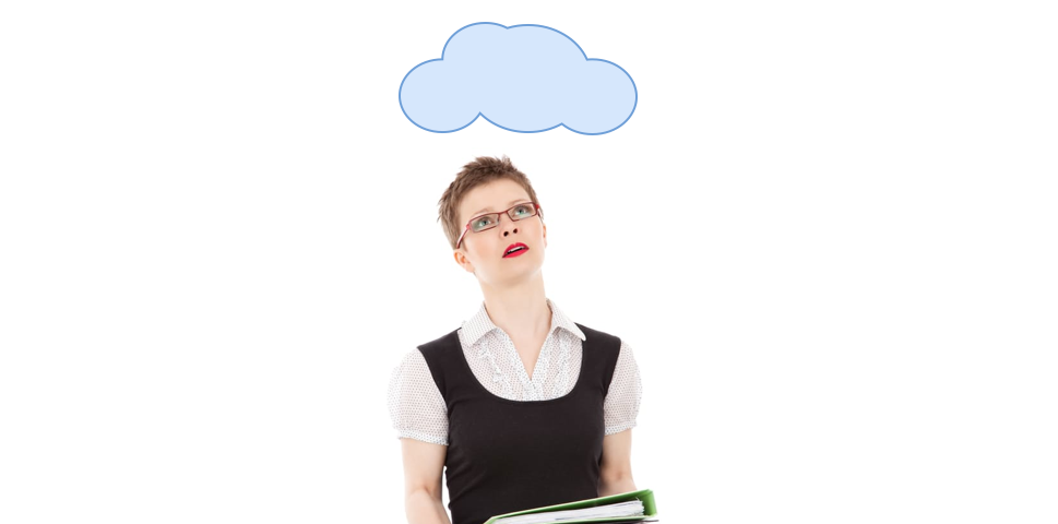 Businesswoman looking up at a cloud